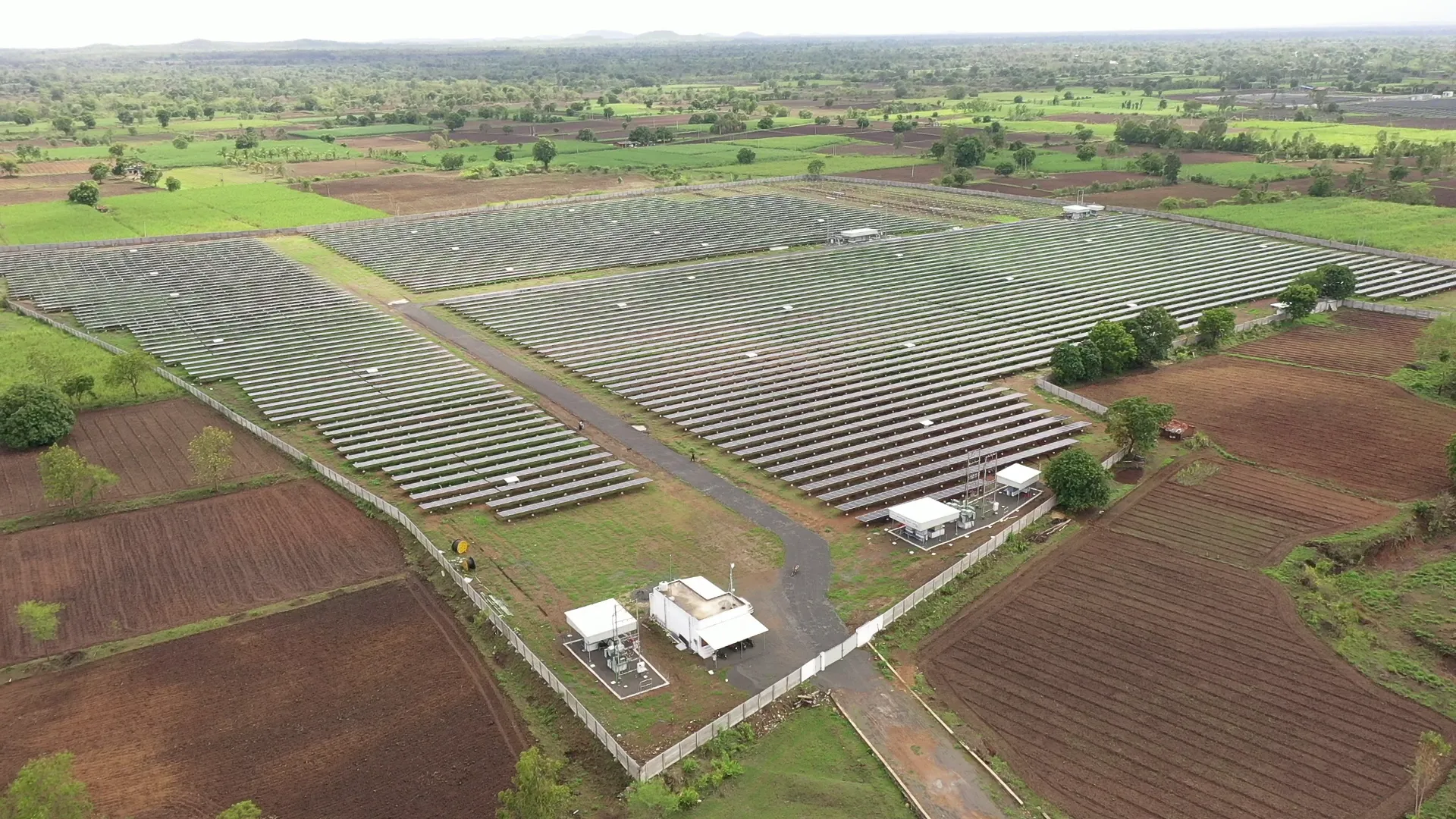 Aerial view of Rayzon Solar Park 1 in Petiya with ground-mounted solar installations.