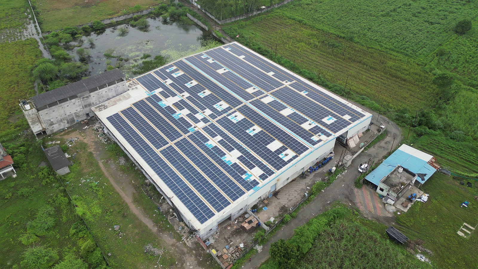 Rooftop solar installation at Raw Edge Industrial Solutions Ltd for sustainable energy generation.